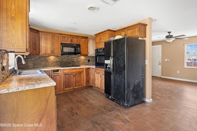 697 Castaways St NE, Palm Bay, FL 32907 - photo 5