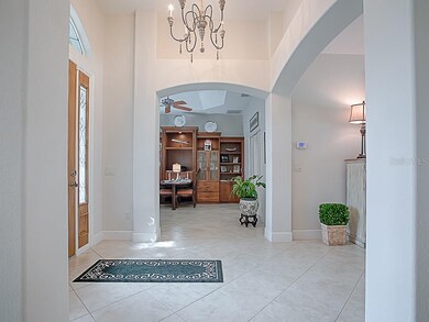 LOOKING FROM THE FOYER WITH ARCHWAYS AND NICHES IN