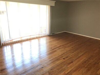 Living Room with bayed window that brings in the light!