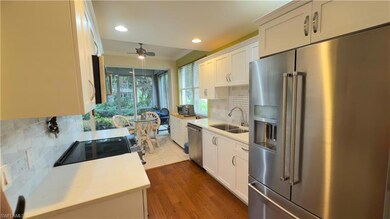 Kitchen featuring light quartz countertops, ceilin
