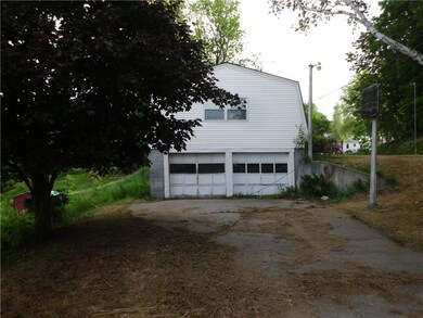 Two Car Garage Under Large Living...