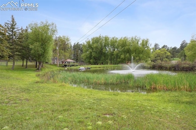 View of yard with a water view