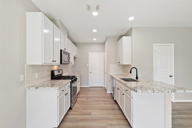 Very nicely equipped kitchen offers a fridge, micr