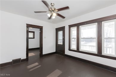 9905 Lamontier Ave, Cleveland, OH 44104 - photo 2