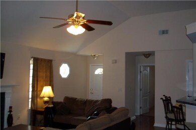 ENTRANCE INTO THIS HOME...HIGH CEILINGS & PLANT LEDGES.  FRESHLY PAINTED WALLS, CEILINGS AND TRIM.