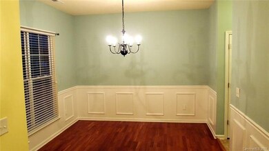 Formal dining with picture frame molding very elegant