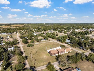 Aerial view of property's location featuring rural landscape