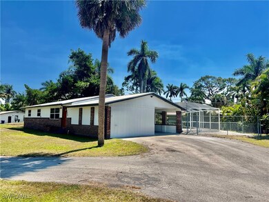 Oversized driveway with plenty of parking.