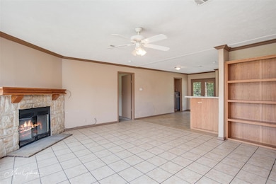 Unfurnished living room with light tile patterned 