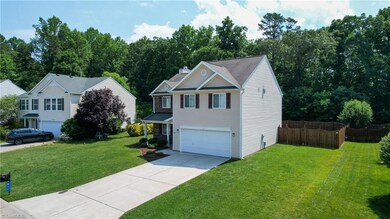 Pristine landscaping & 2-car garage