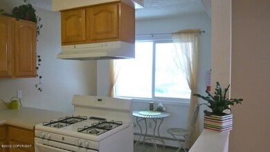 Dining area behind kitchen