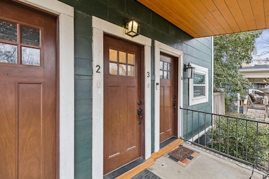 Doorway to property with a porch