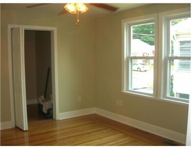 Bedroom. First floor bedroom with hardwoods and wa