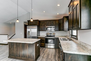 Photos are of a previously completed home with similar design and features. Actual selections, finishes, and materials may vary based on buyer choices and availability.