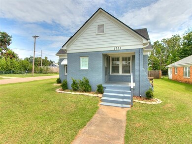 Bungalow-style home featuring a front lawn