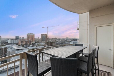 Balcony featuring a view of city