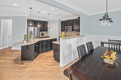 Another view of  the beautiful kitchen from the huge eat-in area!