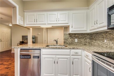 Kitchen features granite countertops, new dishwash