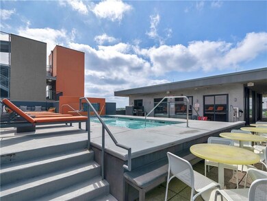 Community pool featuring a patio area