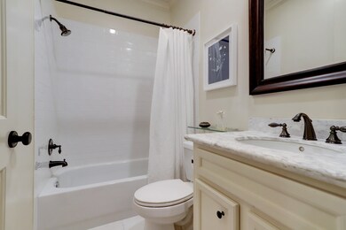 First floor bathroom with tub/shower, wood framed