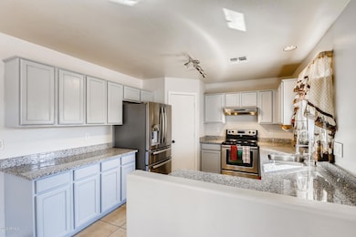 12437 W Valentine Ave El-large-008-008-K