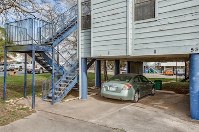 View of parking with stairs