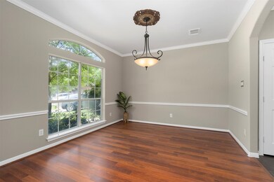Formal dining room leads to the kitchen & utility room
