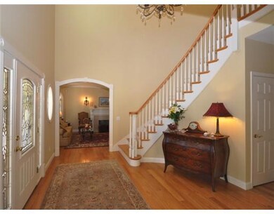 Entry. Two story entry hall with sweeping staircas