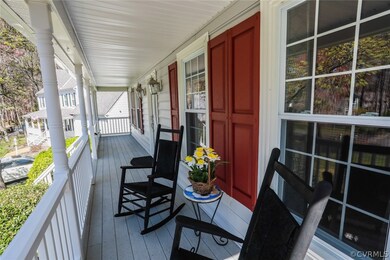 Front country porch with Trex style decking