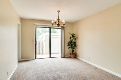 Dining room with sliding doors off to the spacious patio