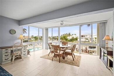 Sunroom / solarium featuring expansive windows and plenty of natural light