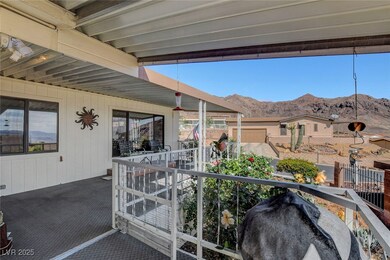 Balcony featuring grilling area and a mountain vie