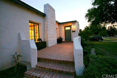 Elegant front porch is very inviting.