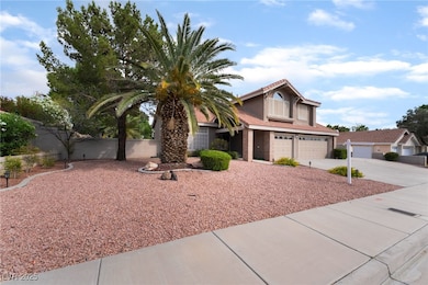View of front of property with an attached garage,