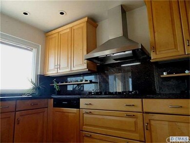 Kitchen w/custom maple cabinetry & high end applia