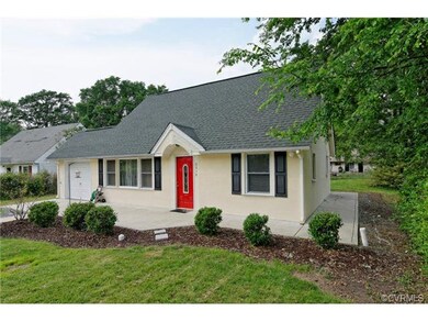 This charming house boasts front yard landscaping,