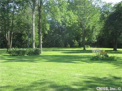 Exterior Front. Mature and nicely manicured lawn..