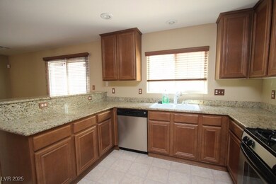 Kitchen with appliances with stainless steel finis