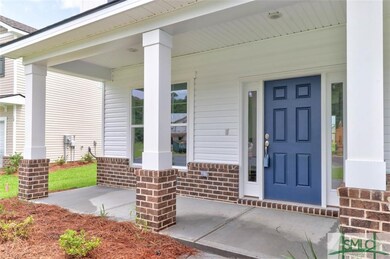 Front Porch with column and Brick Accent