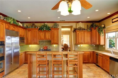 Country style kitchen with cherry wood cabinetry