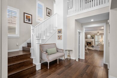 Enter the home to a two-story foyer with a formal living room on the right (can also be used as a formal dining room).