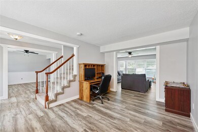 Formal Living Room... Laminate wood flooring throu
