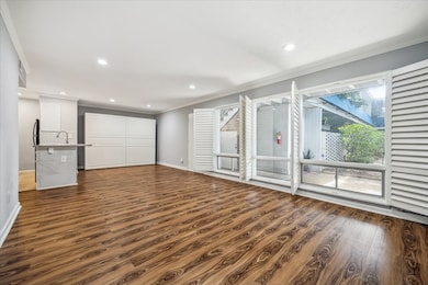 This bright and airy living area seamlessly connec