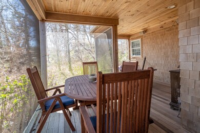 outdoor dining on screened porch