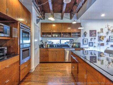 The kitchen has been updated with a newer electric