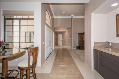 Full wet bar with sink & refrigerator
