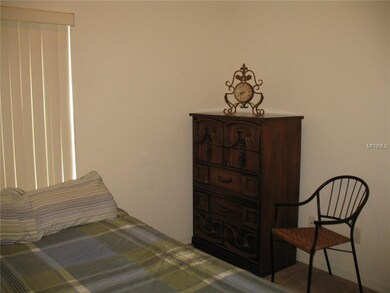 The second of three bedrooms.  Great natural light