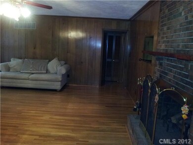Family Room - Family room with fireplace has acces