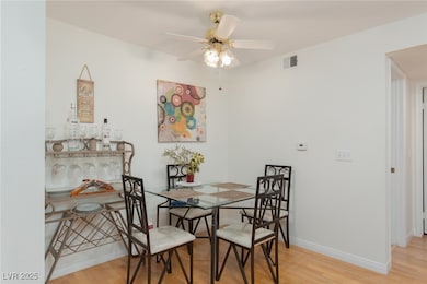 Dining room featuring light wood-type flooring and