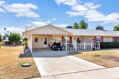 10405 W Kingswood Cir-large-002-9-Front